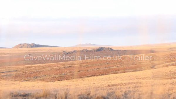 image of open autumn orange brown moorland with rocky exposed hill tops